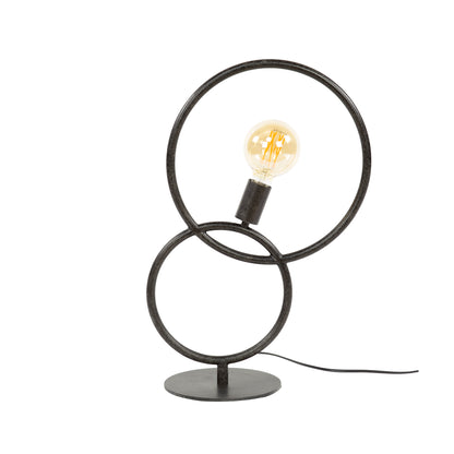 Moderne Tischlampe Loop von lefurn.de mit schlankem Design und warmem Licht auf einem Tisch platziert