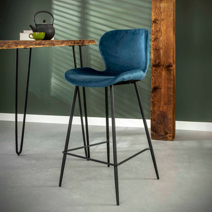 Grauer Barstuhl mit Rundrohrgestell von lefurn.de, gepolstert mit Samtstoff, modernes Design, ideal für Bartheken und Küchen.