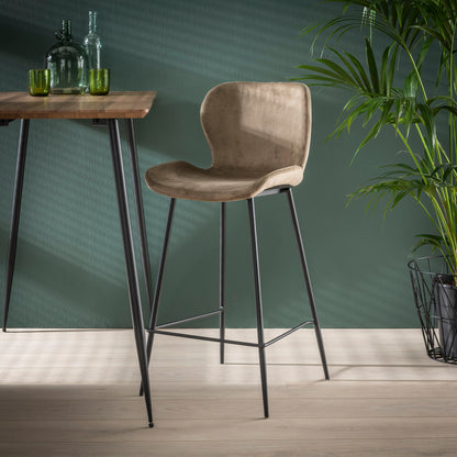 Grauer Barstuhl aus Velours mit Rundrohrgestell von lefurn.de, bequeme Sitzfläche und modernes Design.