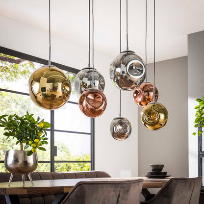 Hängelampe Stellar 4+3 von lefurn.de mit modernen, schwarzen Metallpendeln und warmem Licht für Wohnzimmer oder Essbereich